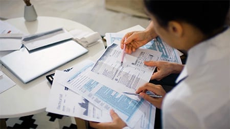 Picture of Someone Doing Taxes for Undifferentiated Support