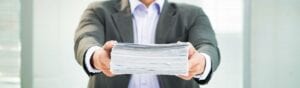 Picture of someone being served with interrogatories and requests for production in a Washington State divorce or family law case.