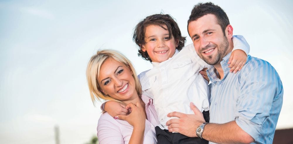 Picture of parents who equally share custody of their child.